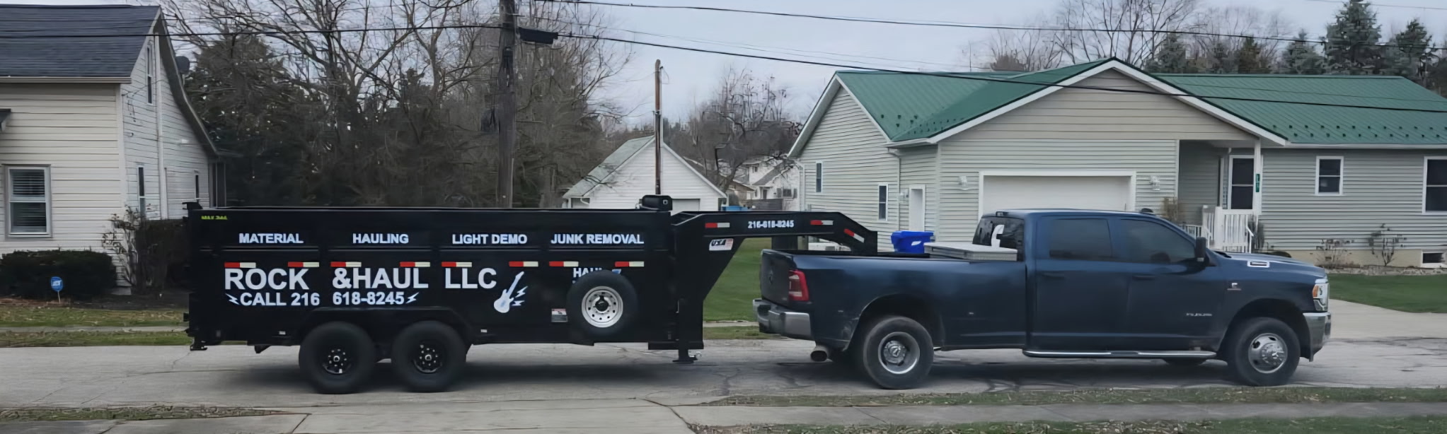 Truck and trailer hauling junk away